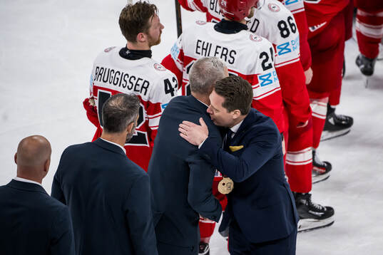 Head coach Mikael Gath of Denmark and Head coach Sam Hallam