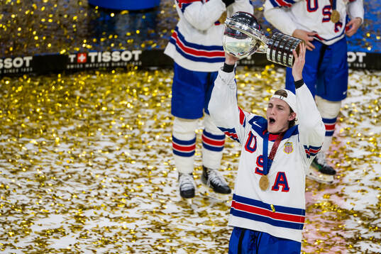 Tage Thompson of USA celebrates with t he trophy