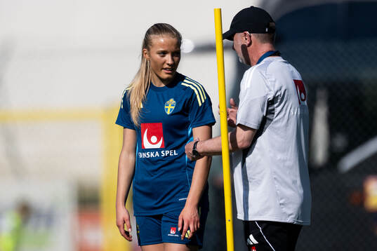 Smilla Holmberg and head coach Peter Gerhardsson of the