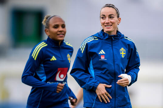 Madelen Janogy and Kosovare Asllani of the Swedish
