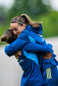 Madelen Janogy and Kosovare Asllani of the Swedish