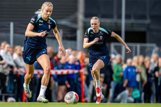 Ada Hegerberg and Karina Sævik of the Norwegian women's