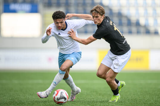 Gefles Malik Mokédé och FC Stockholms Rasmus Allbäck