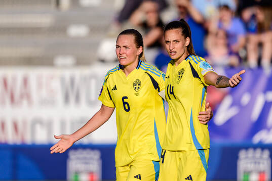 Magdalena Eriksson and Nathalie Björn of Sweden reacts