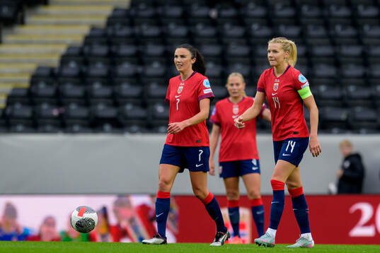 Ingrid Syrstad Engen and Ada Hegerberg of Norway look