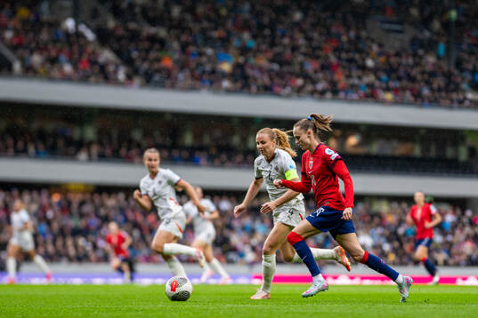 Glodis Viggosdottir of Iceland and Caroline Graham Hansen