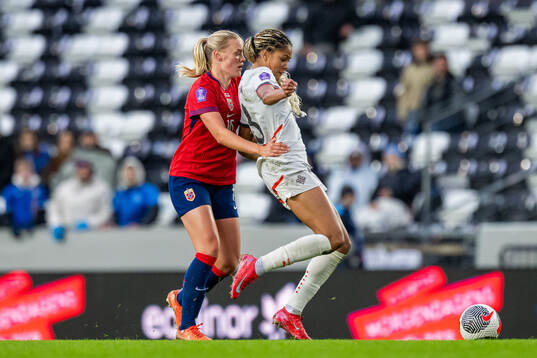 Mathilde Harviken of Norway and Sveindis Jonsdottir of