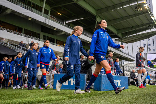 Ingrid Syrstad Engen of Norway enters the pitch