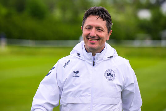Head coach Niels Lawartz of Denmark