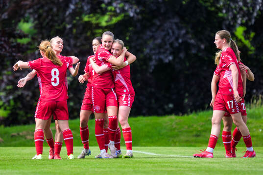 Louise Strauss of Denmark celebrates