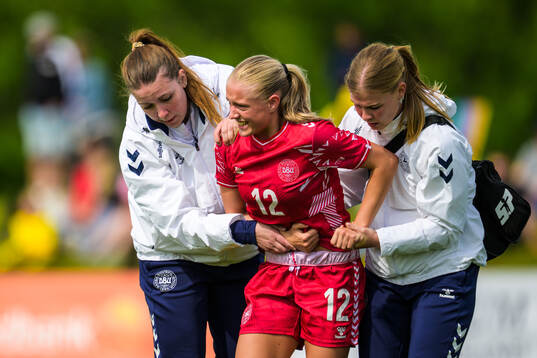 Martha Volquards Hesselholt of Denmark leaves the pitch