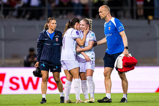 Thea Bjelde of Norway in pain