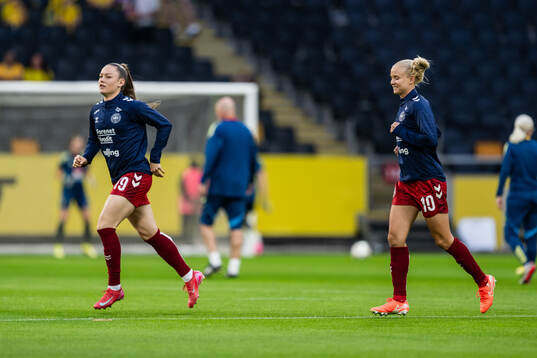 Janni Thomsen and Pernille Harder of Denmark