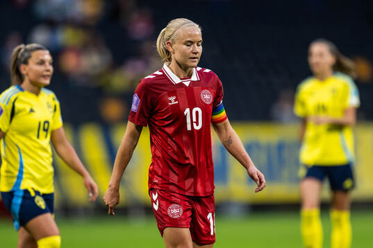 Pernille Harder of Denmark looks dejected