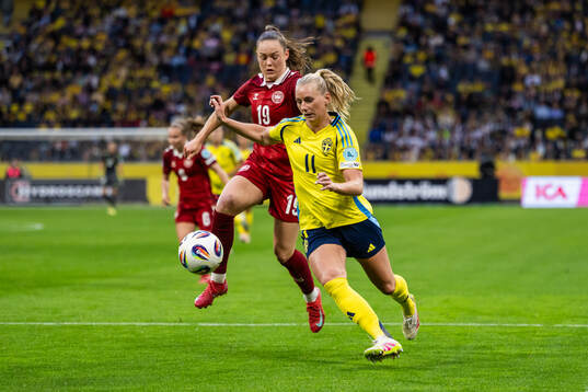 Janni Thomsen of Denmark and Stina Blackstenius of Sweden