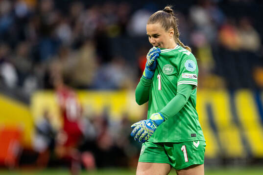 Goalkeeper Maja Bay Østergaard of Denmark looks dejected