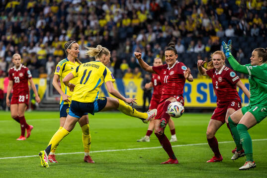 Stina Blackstenius of Sweden scores 5-1 past Katrine Veje,
