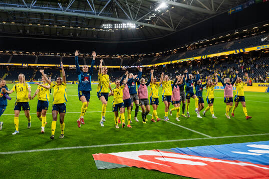 Players of Sweden celebrate