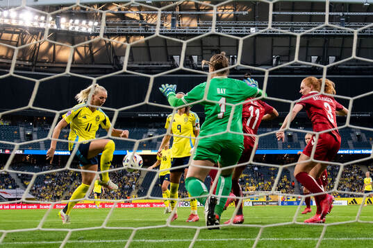 Stina Blackstenius of Sweden scores 5-1 behind goalkeeper