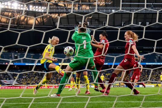 Stina Blackstenius of Sweden scores 5-1 behind goalkeeper