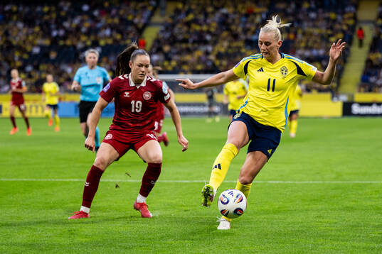 Janni Thomsen of Denmark and Stina Blackstenius of Sweden