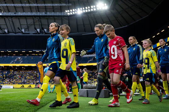 Kosovare Asllani, goalkeeper Jennifer Falk and Jonna