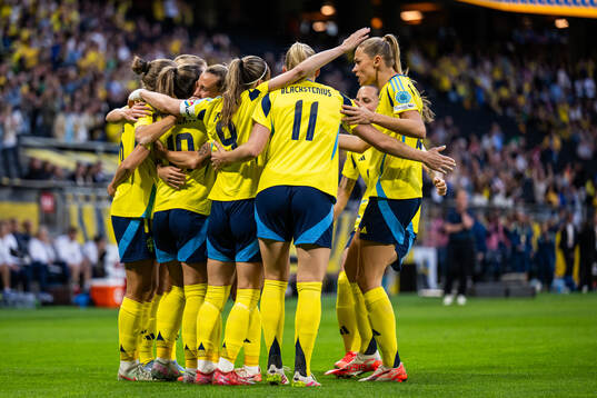 Johanna Rytting Kaneryd of Sweden celebrates with team mates