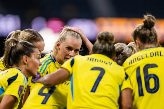 Stina Blackstenius of Sweden celebrates with team mates