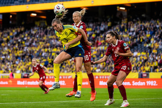 Linda Sembrant of Sweden competes for the ball with