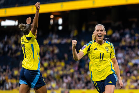 Madelen Janogy and Stina Blackstenius of Sweden celebrates