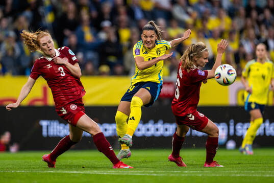 Stine Ballisager and Josefine Hasbo of Denmark compete for