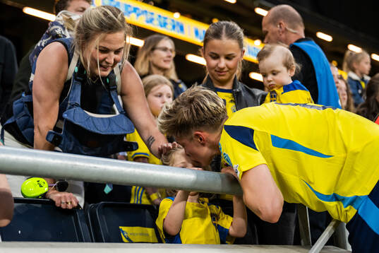 Lina Hurtig of Sweden with her child
