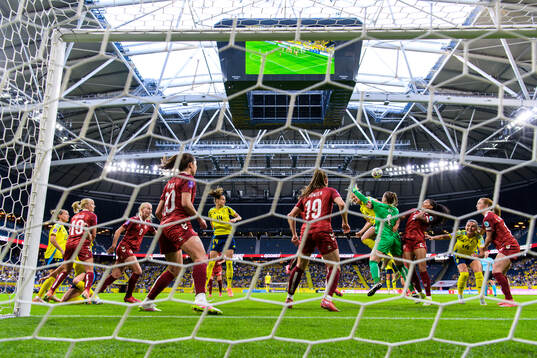 Stina Blackstenius of Sweden in action against goalkeeper