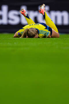 Fridolina Rolfö of Sweden gets injured
