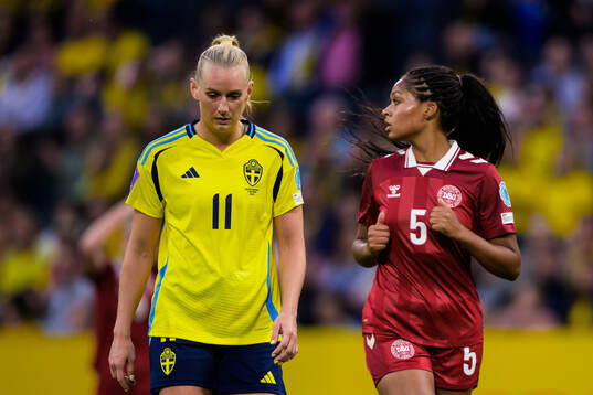 Stina Blackstenius of Sweden and Isabella Obaze of Denmark