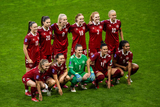 The starting eleven of Denmark pose for a photo