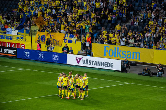 Stina Blackstenius of Sweden celebrates with team mates
