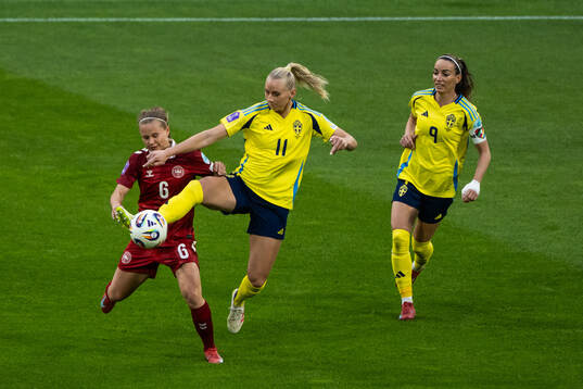 Josefine Hasbo of Denmark compete for the ball with Stina