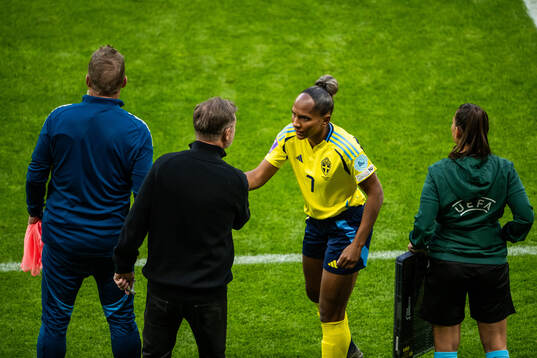 Head coach Peter Gerhardsson and Madelen Janogy of Sweden