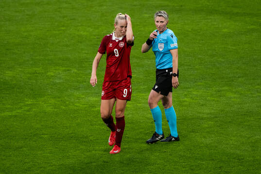 Amalie Vangsgaard of Denmark and referee Jana Adámková