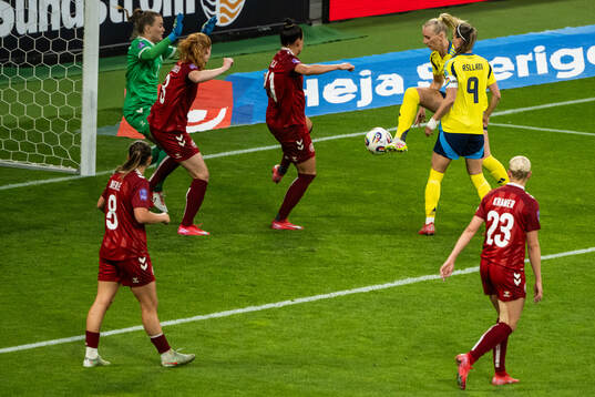 Stina Blackstenius of Sweden scores 5-1 past goalkeeper