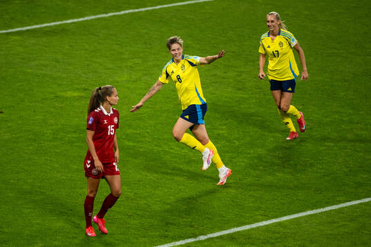 Frederikke Thøgersen of Denmark looks dejected while Lina