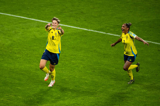 Lina Hurtig and Madelen Janogy of Sweden celebrate