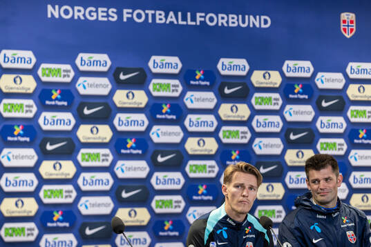 Martin Ødegaard and press officer Morten Morisbak