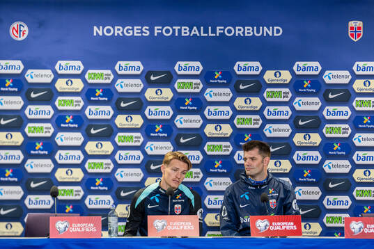 Martin Ødegaard and press officer Morten Morisbak