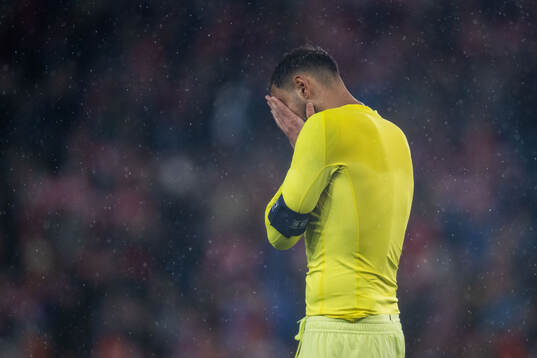 Goalkeeper Gianluigi Donnarumma of Italy looks dejected