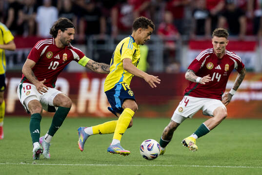 Dominik Szoboszlai and Bendeguz Bolla of Hungary against