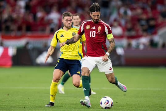 Gabriel Gudmundsson of Sweden and Dominik Szoboszlai of