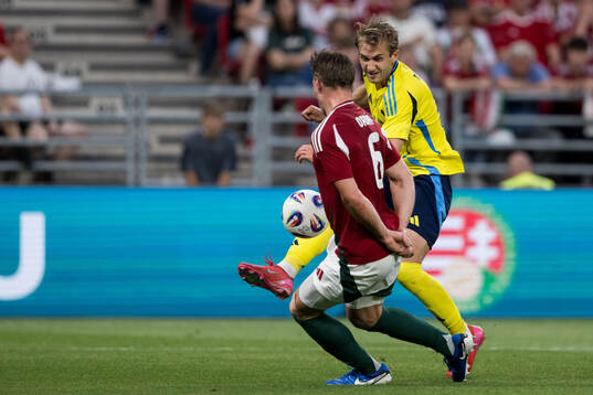 Willi Orban of Hungary and Benjamin Nygren of Sweden uring