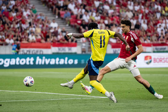 Anthony Elanga of Sweden and Botond Balogh of Hungary